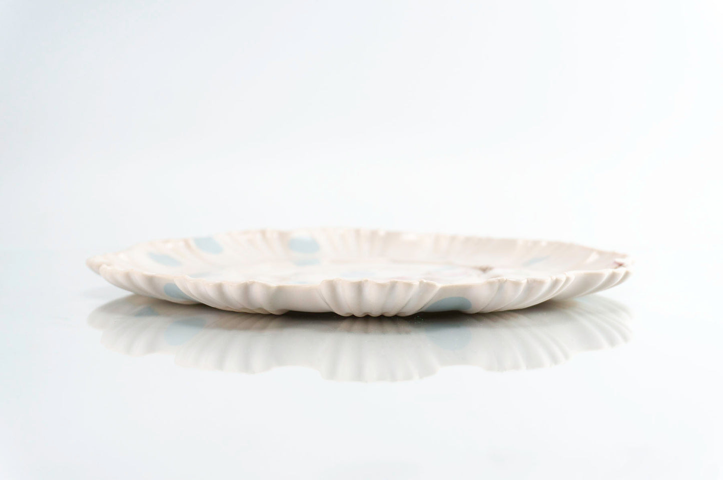 Plat mitjà flor i punt blau (pàg. 275)
