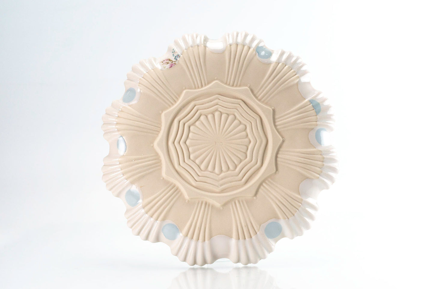Plat mitjà flor i punt blau (pàg. 275)
